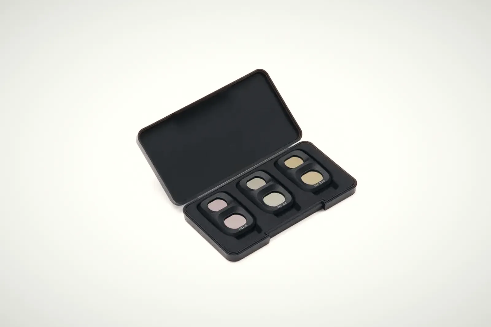 DJI's Osmo Pocket 4P ND filter set: three twin-window filters marked ND16, ND64 and ND256 below their black case