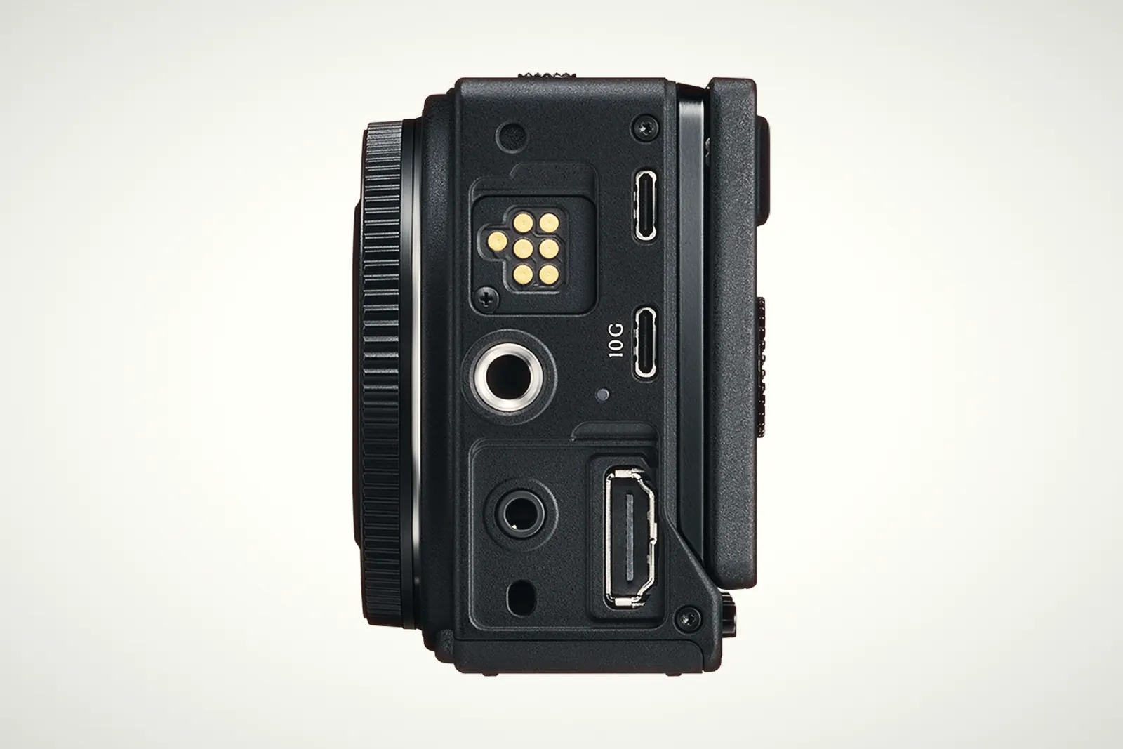 Side view of the Sigma FP2 showing the accessory contacts, two USB-C ports, a 3.5 mm jack, a quarter-inch thread and a full-size HDMI port