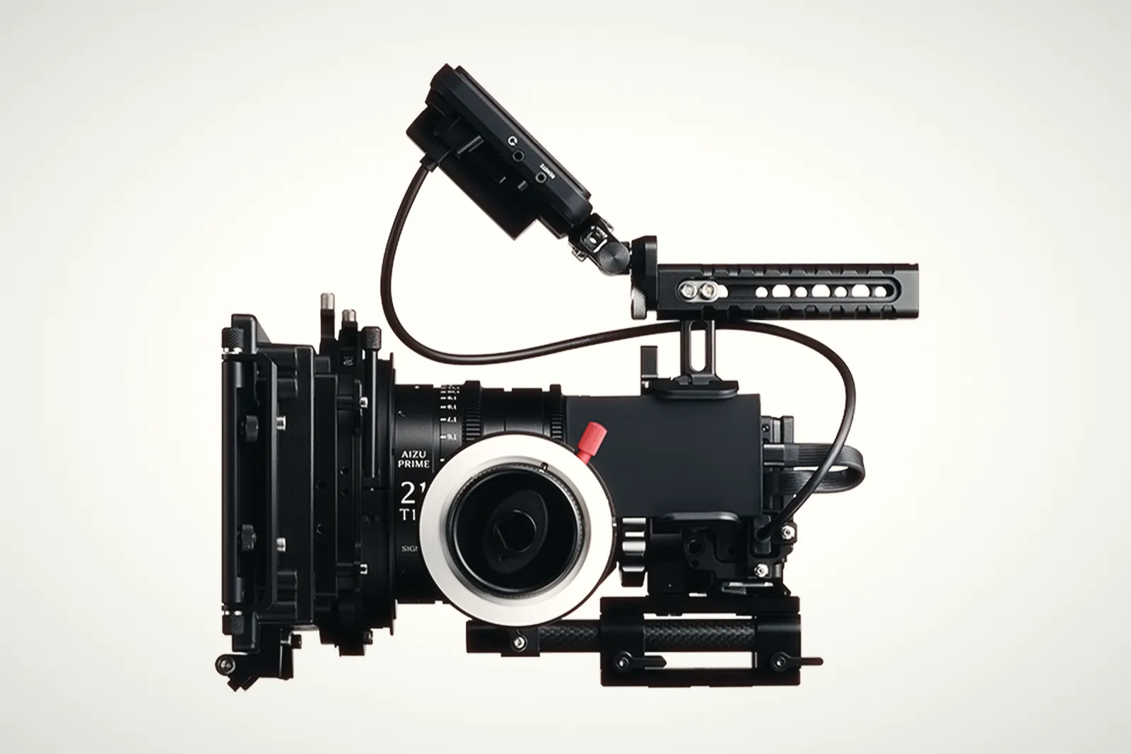 The Sigma FP2 rigged as a cinema camera with a cine prime, matte box, follow focus, top handle and external monitor